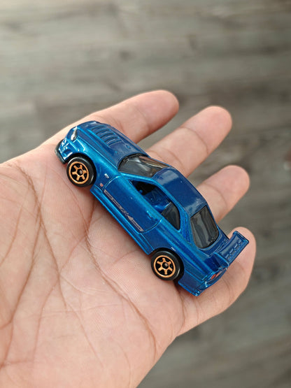 Hot Wheels Nissan Skyline GT-R BNR34 - Blue (Uncarded - New) - Kinder Logs