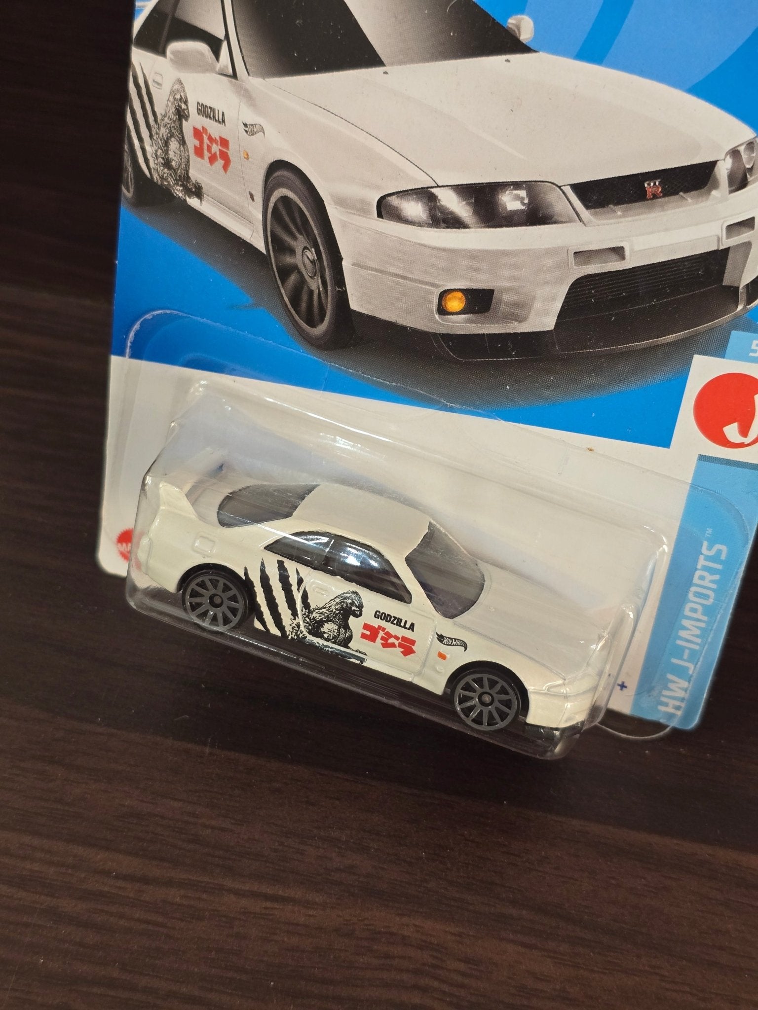 Hot Wheels Nissan Skyline GT - R R33 Godzilla - White (2021 Imported ERROR Card) - Kinder Logs