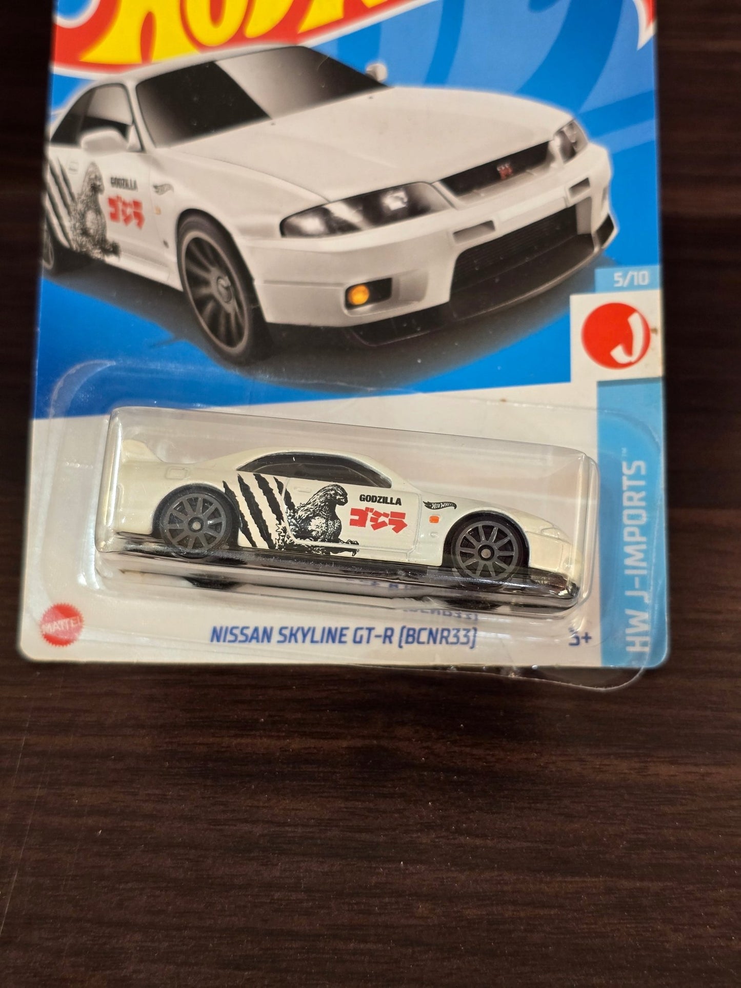 Hot Wheels Nissan Skyline GT - R R33 Godzilla - White (2021 Imported ERROR Card) - Kinder Logs