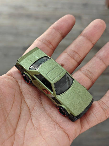 Hot Wheels Nissan Skyline RS KDR30 - Green (Uncarded - New) - Kinder Logs