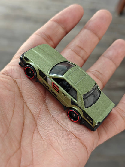 Hot Wheels Nissan Skyline RS KDR30 - Green (Uncarded - New) - Kinder Logs