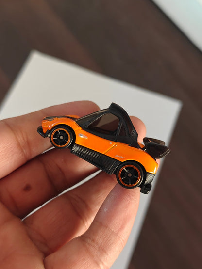 Hot Wheels Pagani Zonda Cinque Tooned - Orange (Uncarded - New) - Kinder Logs