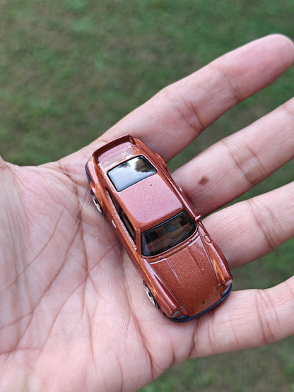 Hot Wheels Porsche 911 Carrera RS 2.7 - Brown (Uncarded - New) - Kinder Logs
