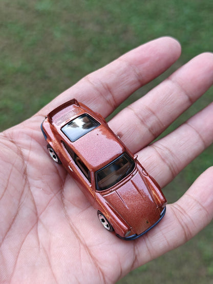 Hot Wheels Porsche 911 Carrera RS 2.7 - Brown (Uncarded - New) - Kinder Logs