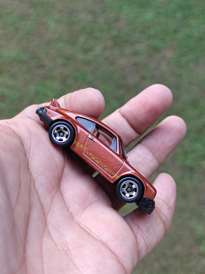 Hot Wheels Porsche 911 Carrera RS 2.7 - Brown (Uncarded - New) - Kinder Logs