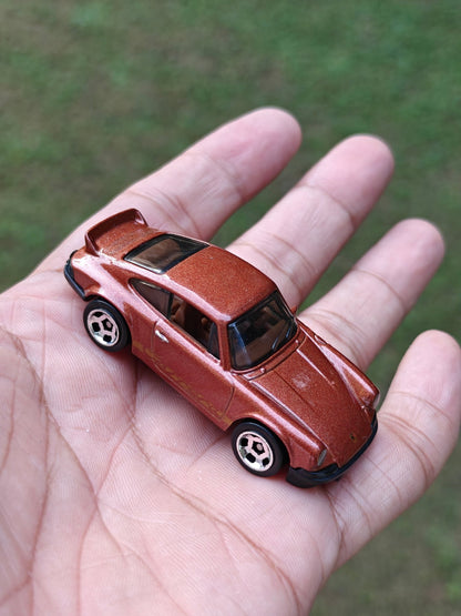 Hot Wheels Porsche 911 Carrera RS 2.7 - Brown (Uncarded - New) - Kinder Logs