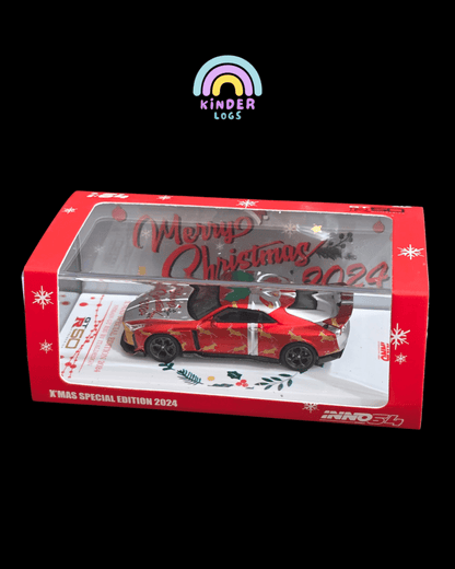 Inno64 Nissan GT - R50 Italdesign Christmas Edition - Kinder Logs