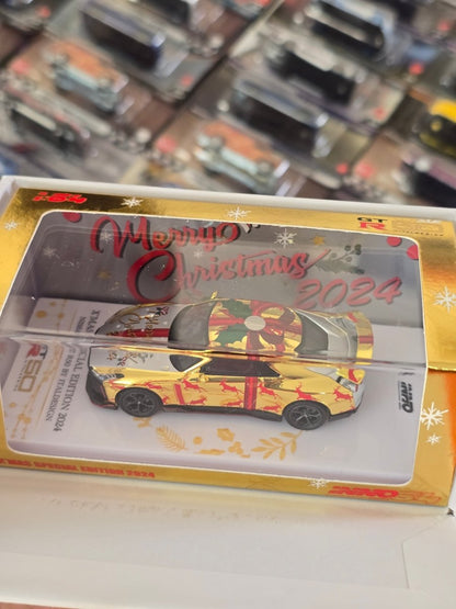 Inno64 Nissan GT - R50 Italdesign Christmas Edition (CHASE) - Kinder Logs