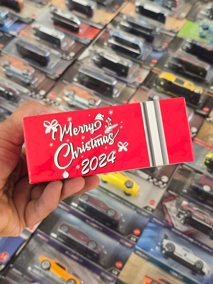 Inno64 Nissan GT - R50 Italdesign Christmas Edition (CHASE) - Kinder Logs