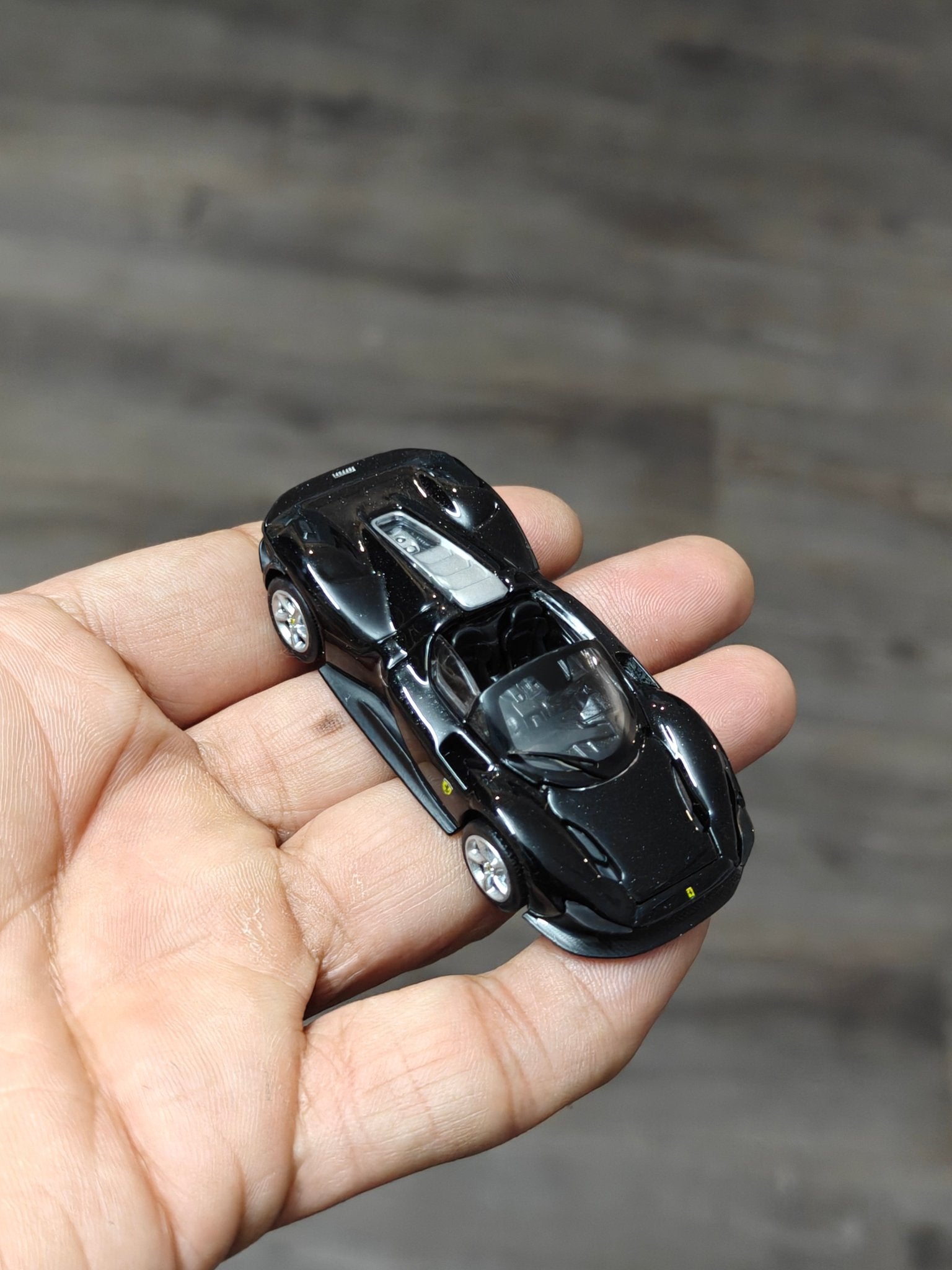 Maisto Ferrari Daytona SP3 - Black (Open Box) - Kinder Logs