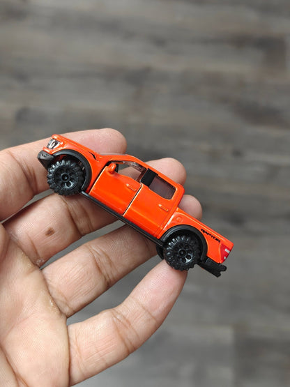 Majorette Ford F - 150 Raptor - Orange (Uncarded - New) - Kinder Logs