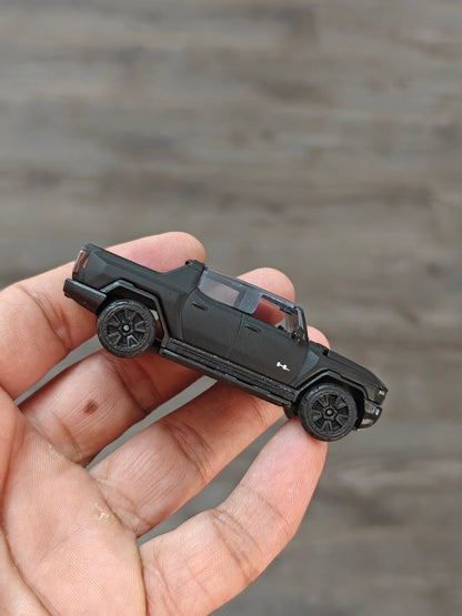 Majorette GMC Hummer EV Black Edition (Uncarded - New) - Kinder Logs
