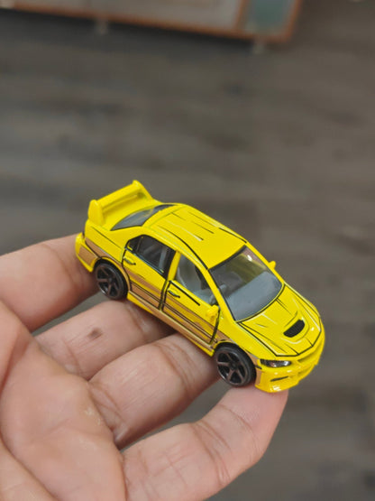 Majorette JDM Mitsubishi Lancer Evolution 9 - Yellow (Uncarded - New) - Kinder Logs