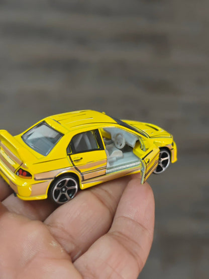 Majorette JDM Mitsubishi Lancer Evolution 9 - Yellow (Uncarded - New) - Kinder Logs
