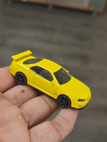 Majorette JDM Nissan Skyline GT - R (R34) - Yellow (Uncarded - New) - Kinder Logs