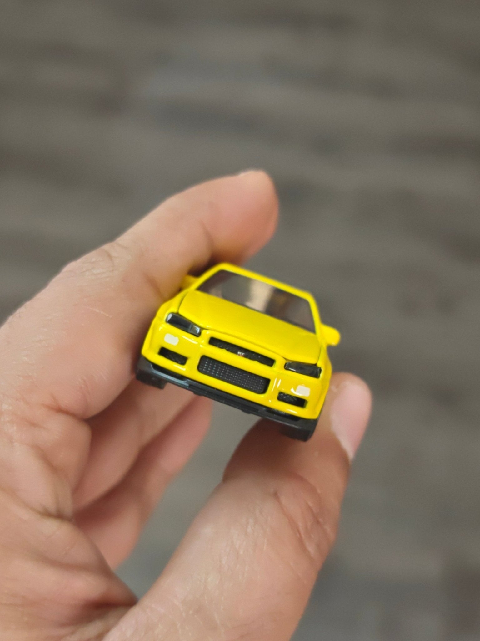Majorette JDM Nissan Skyline GT - R (R34) - Yellow (Uncarded - New) - Kinder Logs