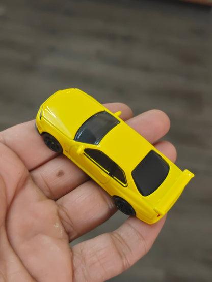 Majorette JDM Nissan Skyline GT - R (R34) - Yellow (Uncarded - New) - Kinder Logs