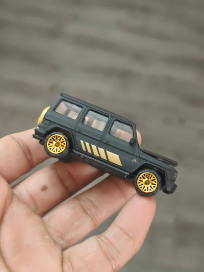 Majorette Mercedes - AMG G63 Matte Black With Gold Wheels (Uncarded - New) - Kinder Logs