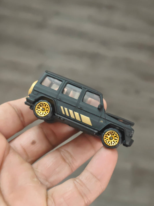 Majorette Mercedes - AMG G63 Matte Black With Gold Wheels (Uncarded - New) - Kinder Logs