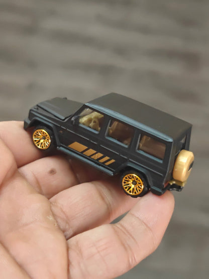Majorette Mercedes - AMG G63 Matte Black With Gold Wheels (Uncarded - New) - Kinder Logs