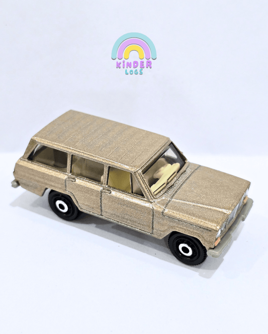 Matchbox 1964 Jeep Wagoneer - Metallic Beige (Uncarded) - Kinder Logs