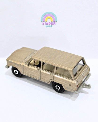 Matchbox 1964 Jeep Wagoneer - Metallic Beige (Uncarded) - Kinder Logs