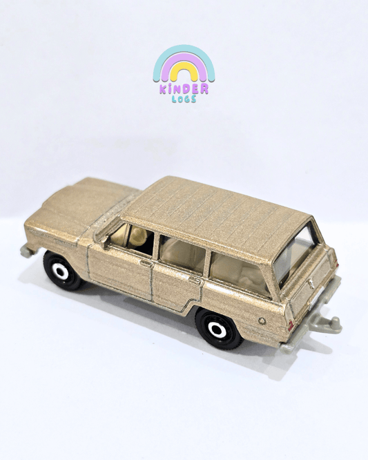 Matchbox 1964 Jeep Wagoneer - Metallic Beige (Uncarded) - Kinder Logs