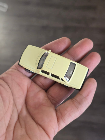 Matchbox 1986 Volvo 240 - Light Yellow (Uncarded - New) - Kinder Logs