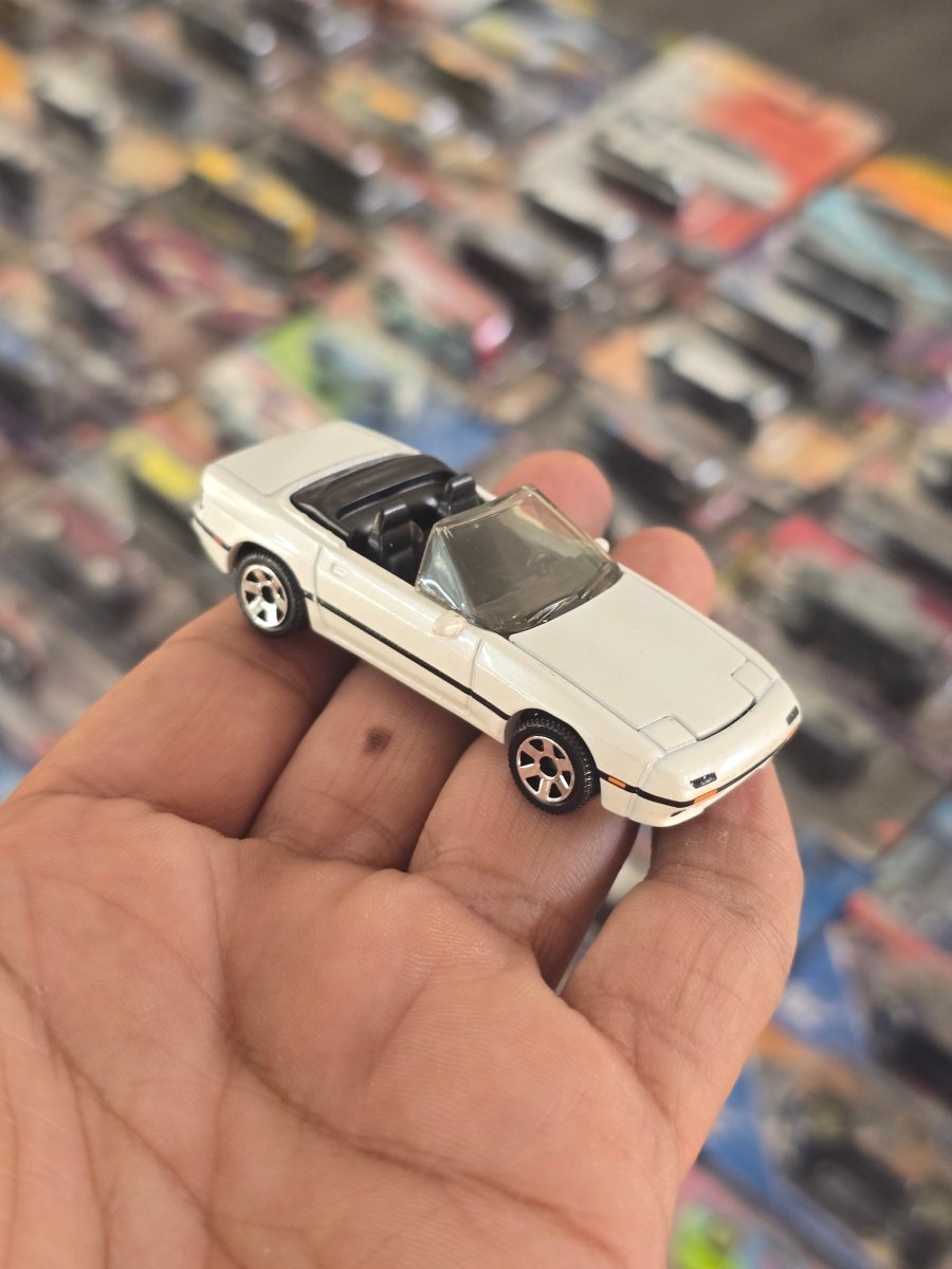 Matchbox 1988 Mazda RX7 - Moving Parts (Uncarded) - Kinder Logs