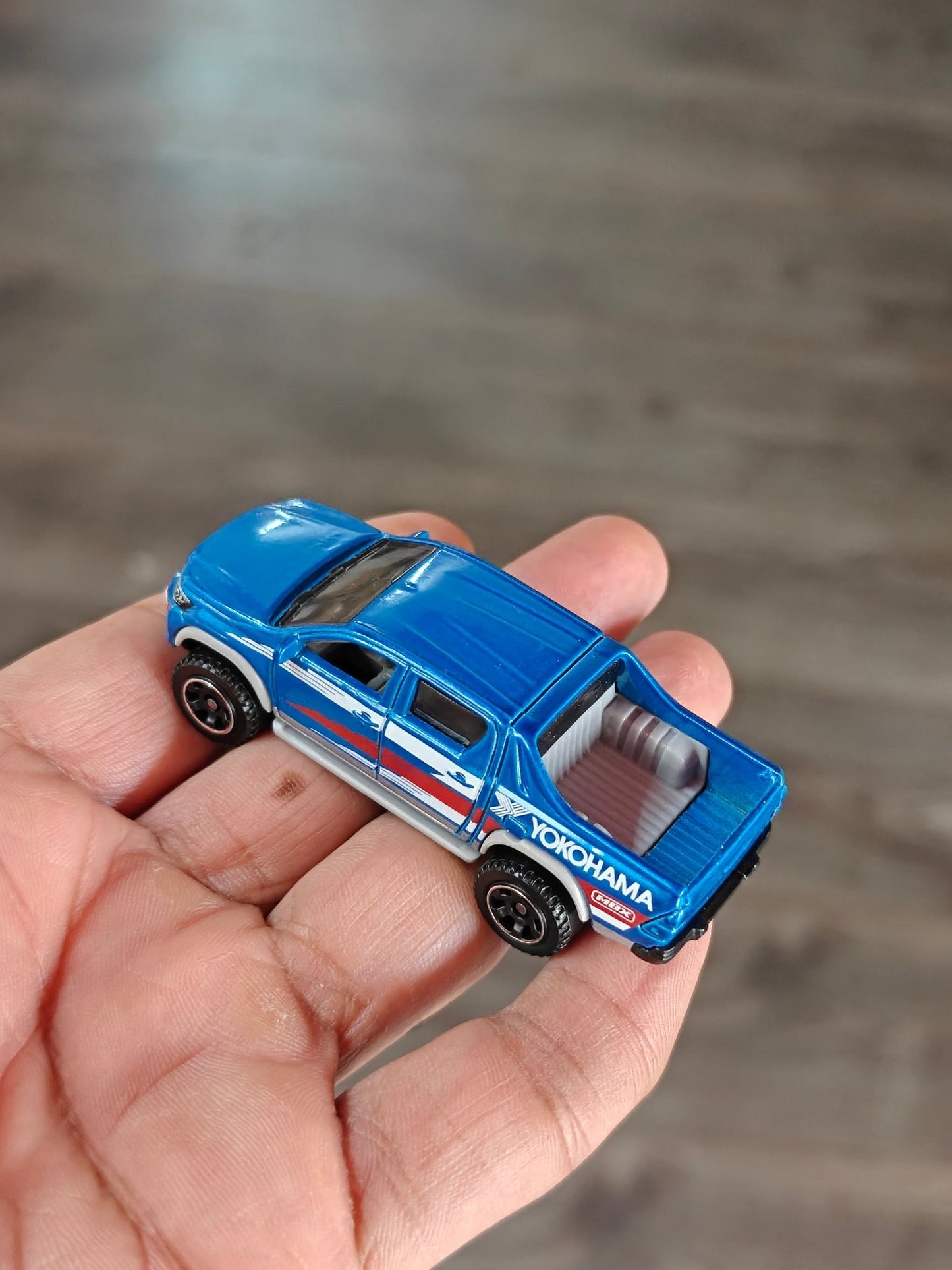 Matchbox 2018 Toyota Hilux YOKOHAMA Edition (Uncarded - New) - Kinder Logs
