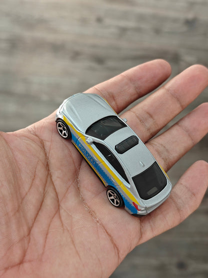 Matchbox 2023 BMW i4 Police Car - Silver (Uncarded - New) - Kinder Logs