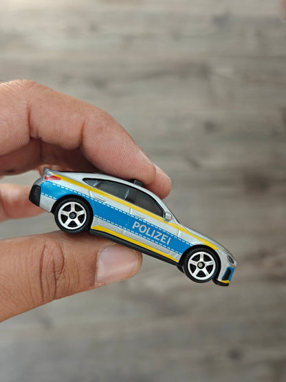Matchbox 2023 BMW i4 Police Car - Silver (Uncarded - New) - Kinder Logs