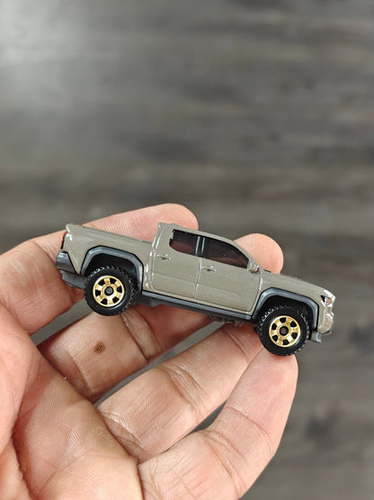 Matchbox 2024 Toyota Tacoma (Uncarded - New) - Kinder Logs