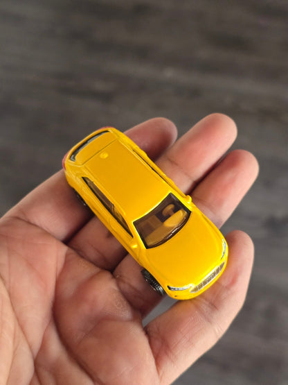 Matchbox Audi e - Tron EV - Yellow (Uncarded - New) - Kinder Logs