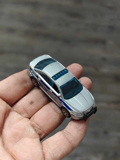 Matchbox Ford Police Interceptor (Uncarded - New) - Kinder Logs