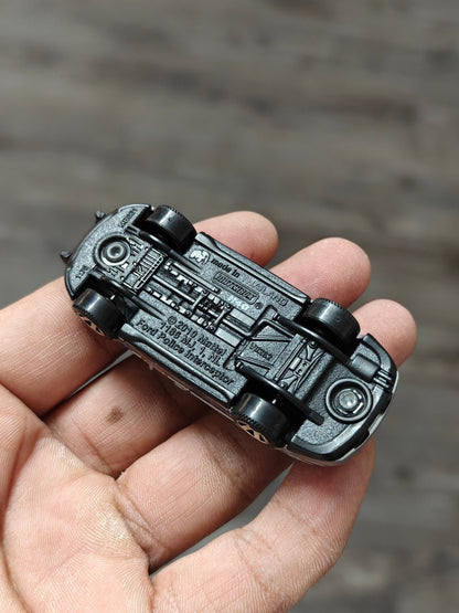 Matchbox Ford Police Interceptor (Uncarded - New) - Kinder Logs