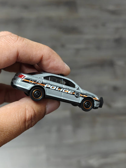 Matchbox Ford Police Interceptor (Uncarded - New) - Kinder Logs