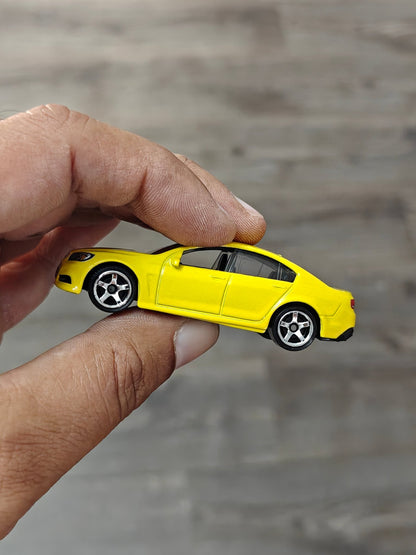 Matchbox Holden VF Commodore SSV - Yellow (Uncarded - New) - Kinder Logs