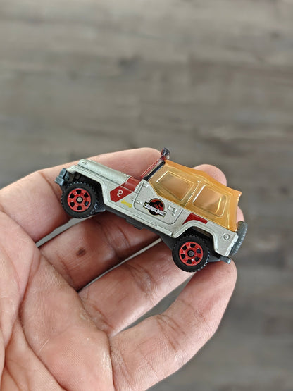 Matchbox Jeep Wrangler 12 - Jurassic World Rebirth (Uncarded - New) - Kinder Logs