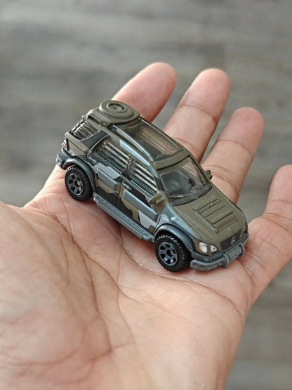 Matchbox Mercedes - Benz ML 320 - Jurassic World Rebirth (Uncarded) - Kinder Logs