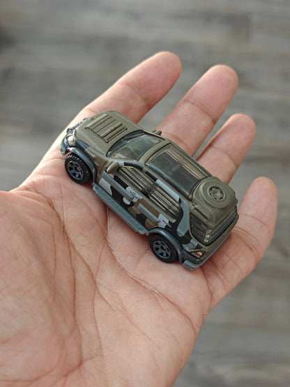 Matchbox Mercedes - Benz ML 320 - Jurassic World Rebirth (Uncarded) - Kinder Logs