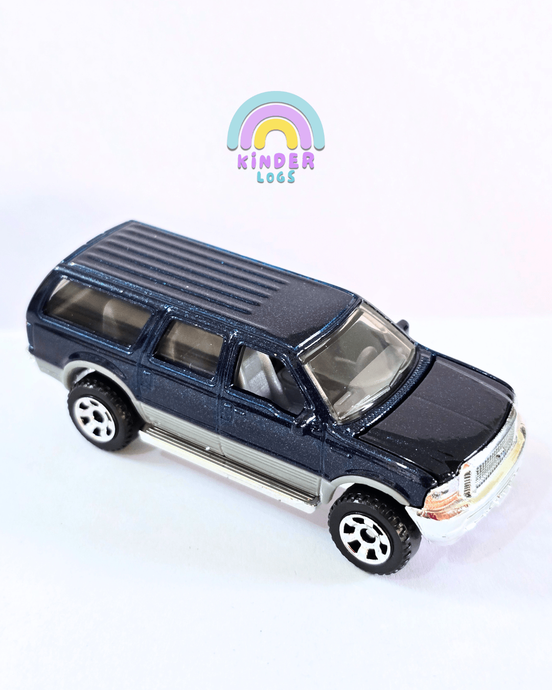 Matchbox Moving Parts 2004 Ford Excursion (Uncarded - New) - Kinder Logs