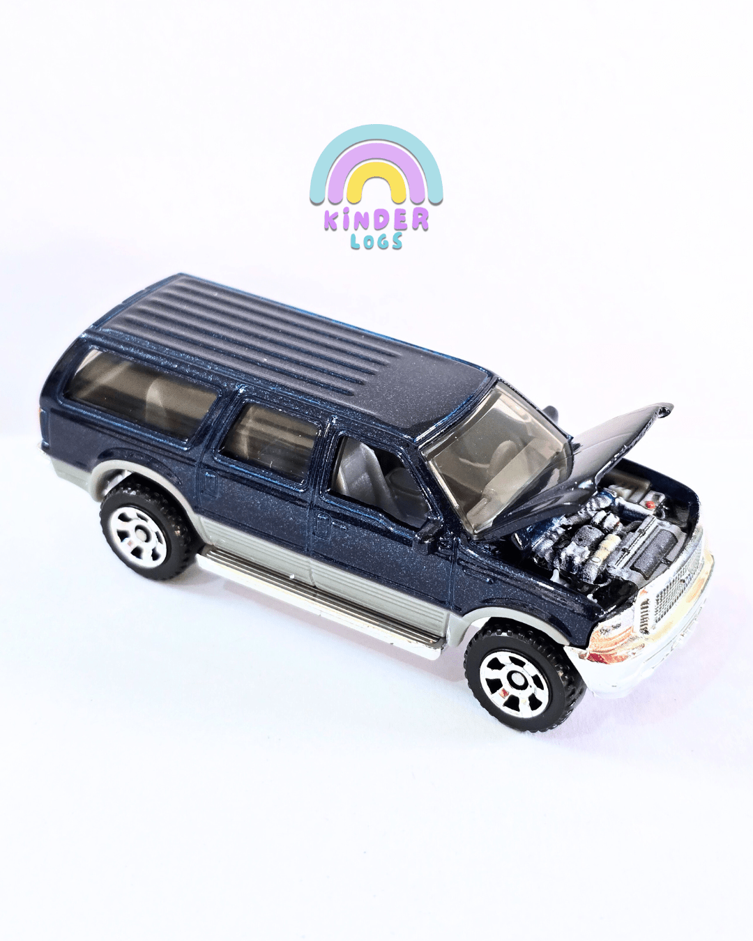 Matchbox Moving Parts 2004 Ford Excursion (Uncarded - New) - Kinder Logs