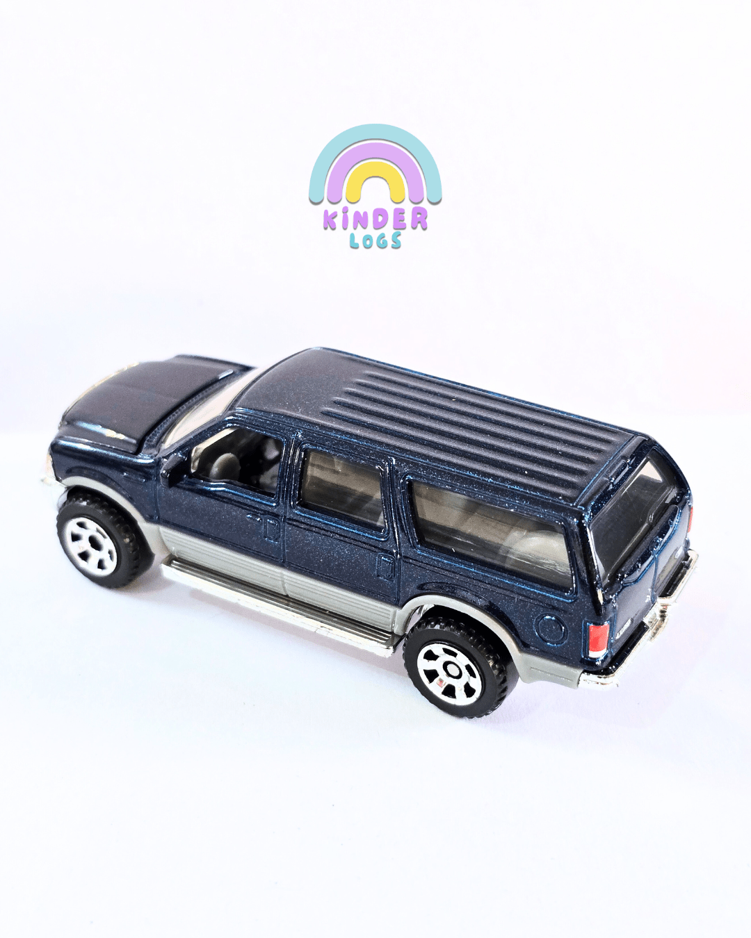 Matchbox Moving Parts 2004 Ford Excursion (Uncarded - New) - Kinder Logs