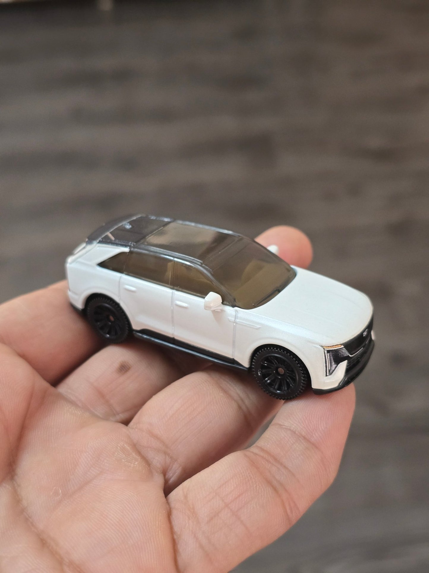 Matchbox Moving parts 2025 Cadillac Escalade IQ (Uncarded - New) - Kinder Logs