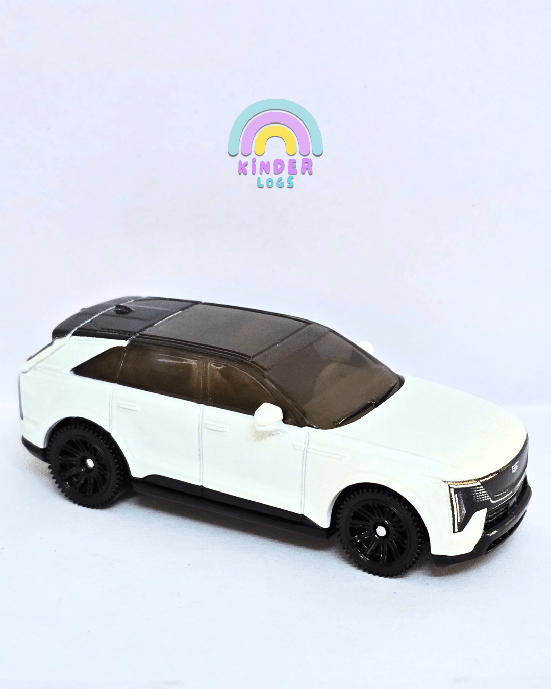 Matchbox Moving parts 2025 Cadillac Escalade IQ (Uncarded - New) - Kinder Logs