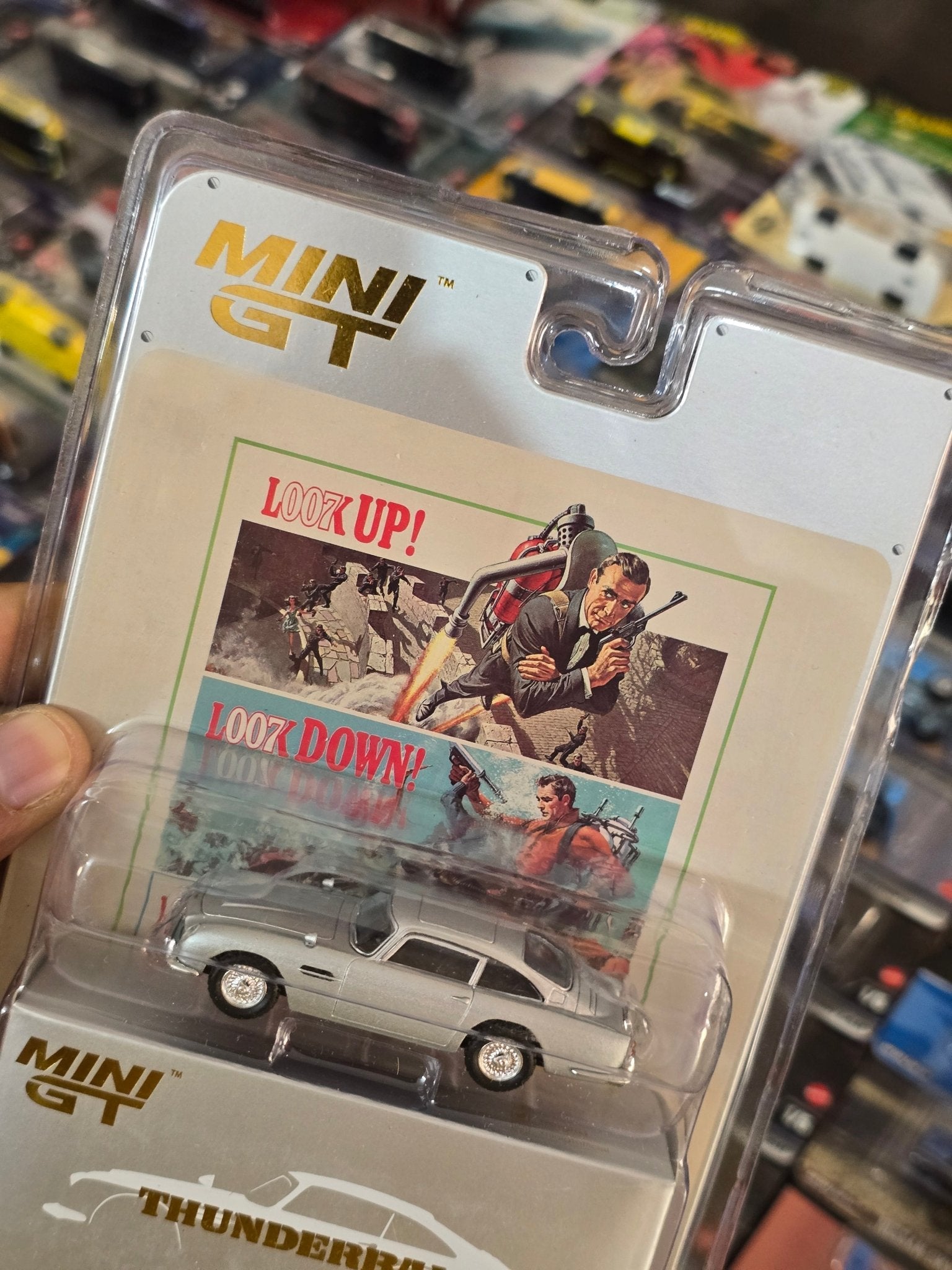 Mini GT Aston Martin DB5 “Thunderball” - Blister Pack - Kinder Logs