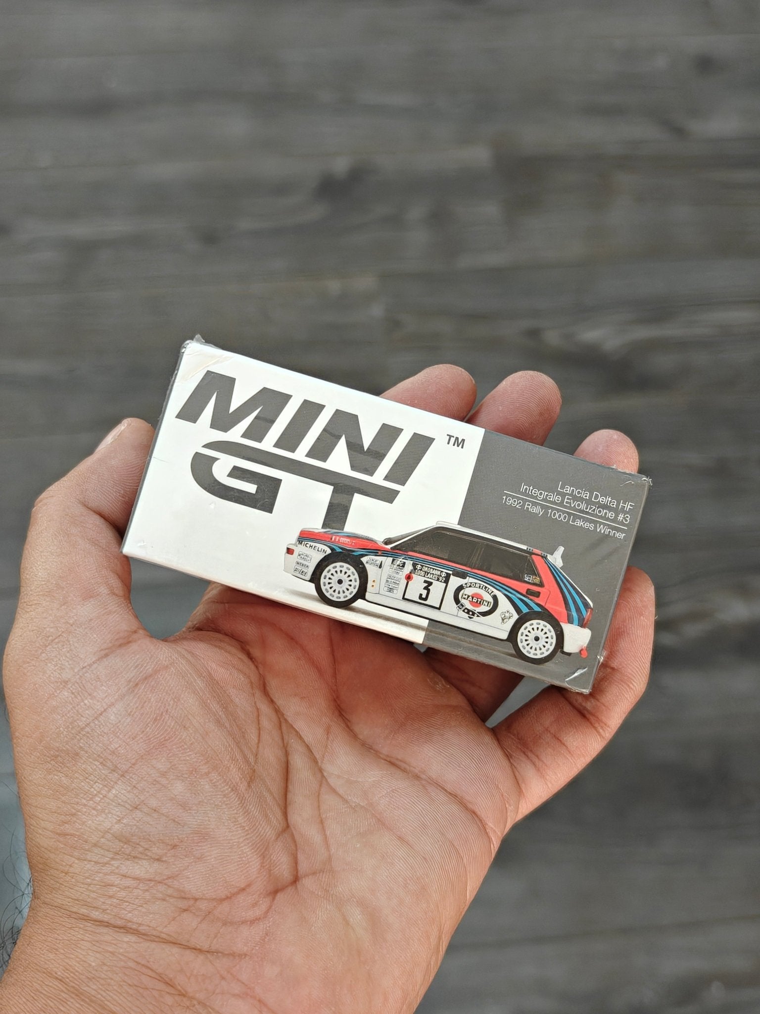Mini GT Lancia Delta HF Integrale Evoluzione - 1992 Rally 1000 Lakes Winner 3 (Sealed Box) - Kinder Logs