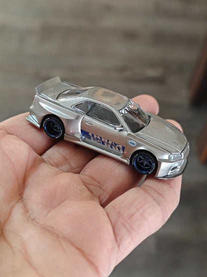 Mini GT Nissan Skyline GT - R (R34) Kaido Works Shinjuku V1 (Open Box) - Kinder Logs