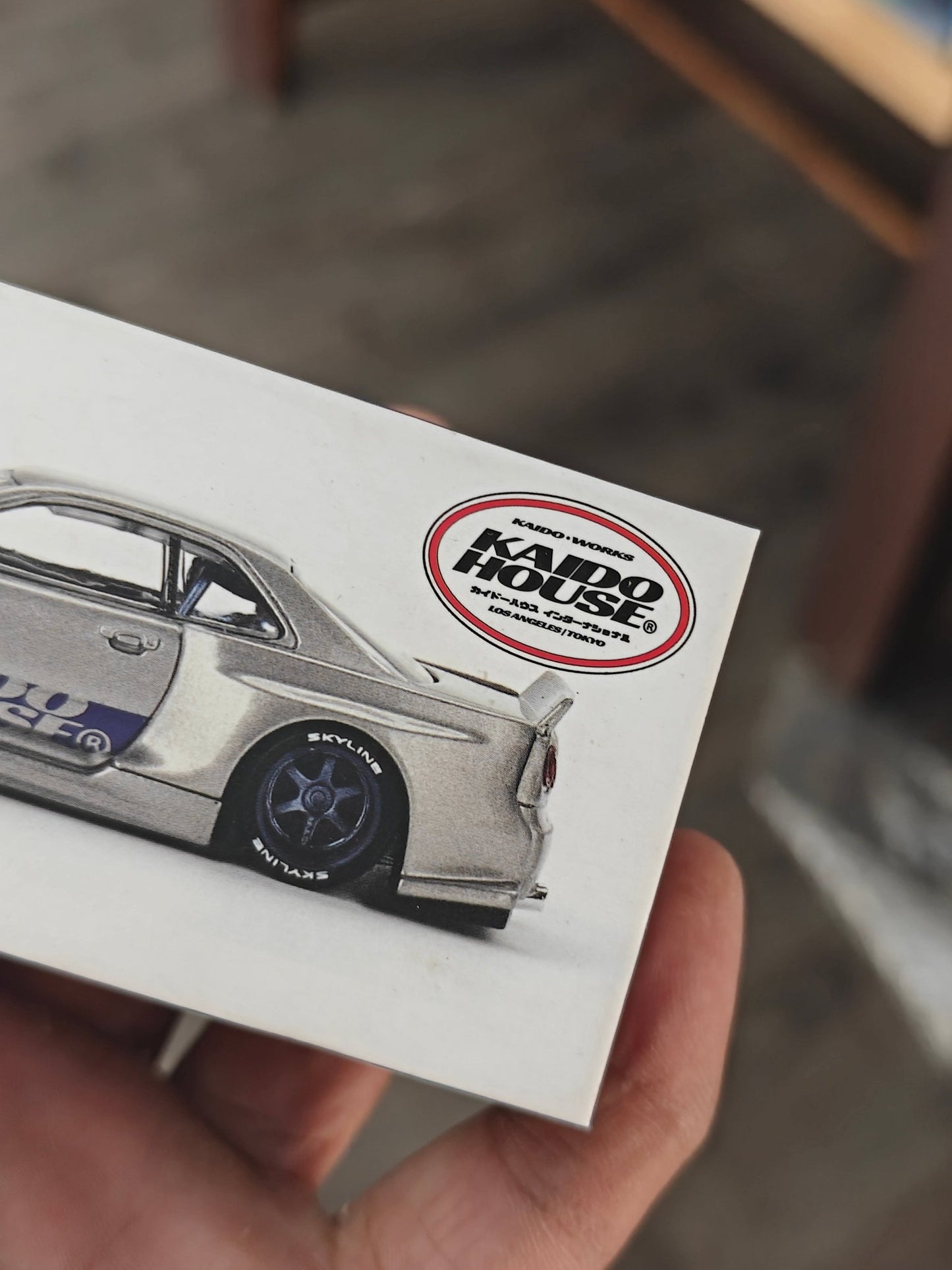 Mini GT Nissan Skyline GT - R (R34) Kaido Works Shinjuku V1 (Open Box) - Kinder Logs